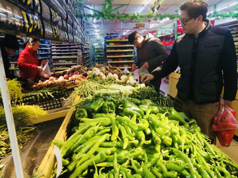 北京新发地农产品交易市场:菜篮子里的美好生活